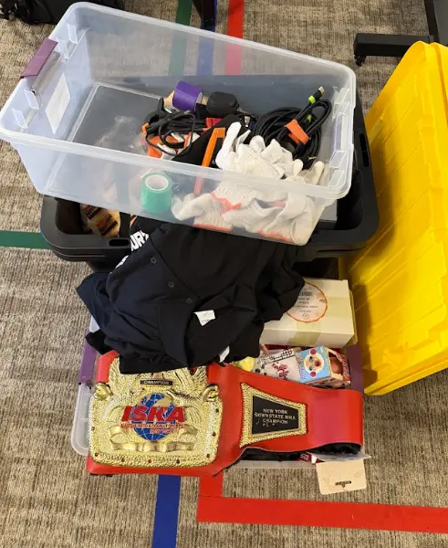 Wardrobe, cables, and a championship belt