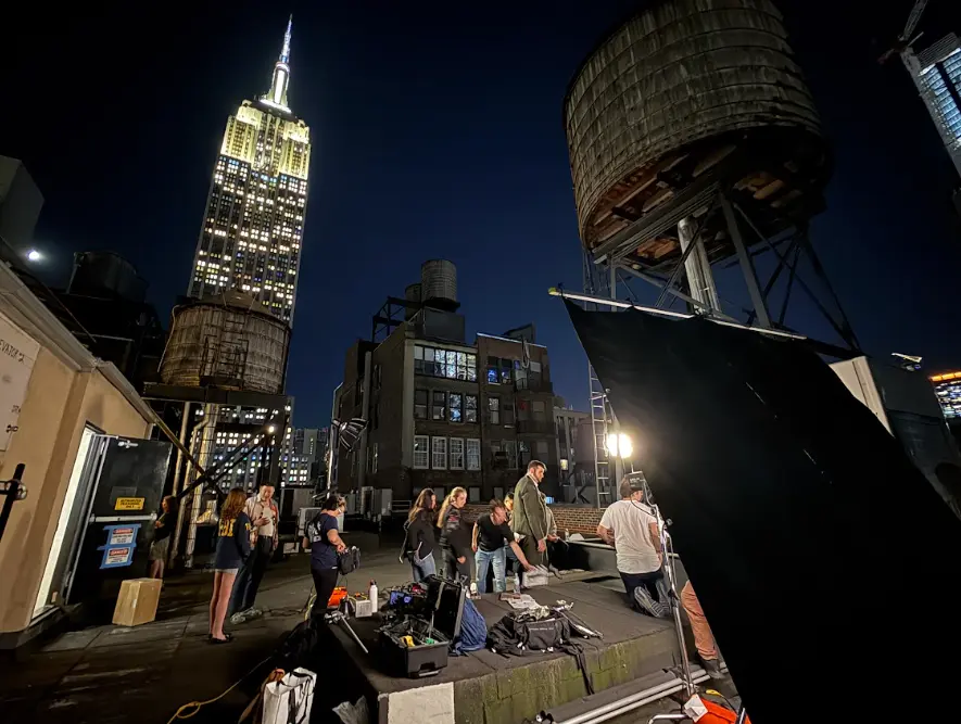 The crew films beneath the Empire State Building
