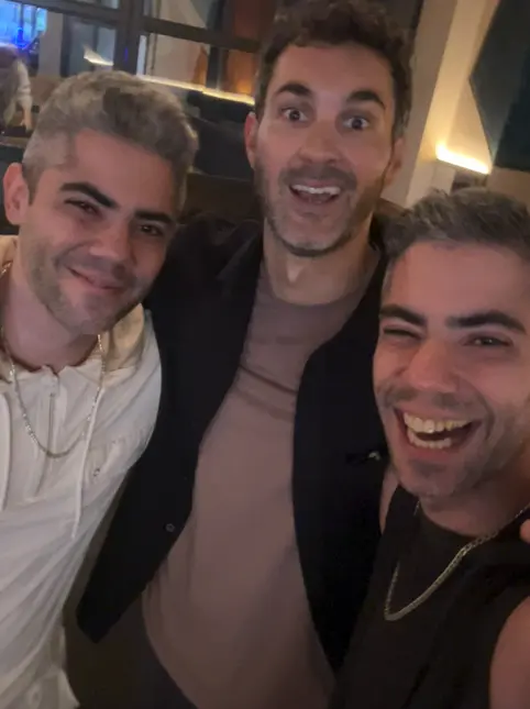 Cast members celebrate together